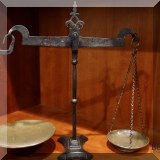 D49. Brass and iron scale. 19”h x 19”w - $95